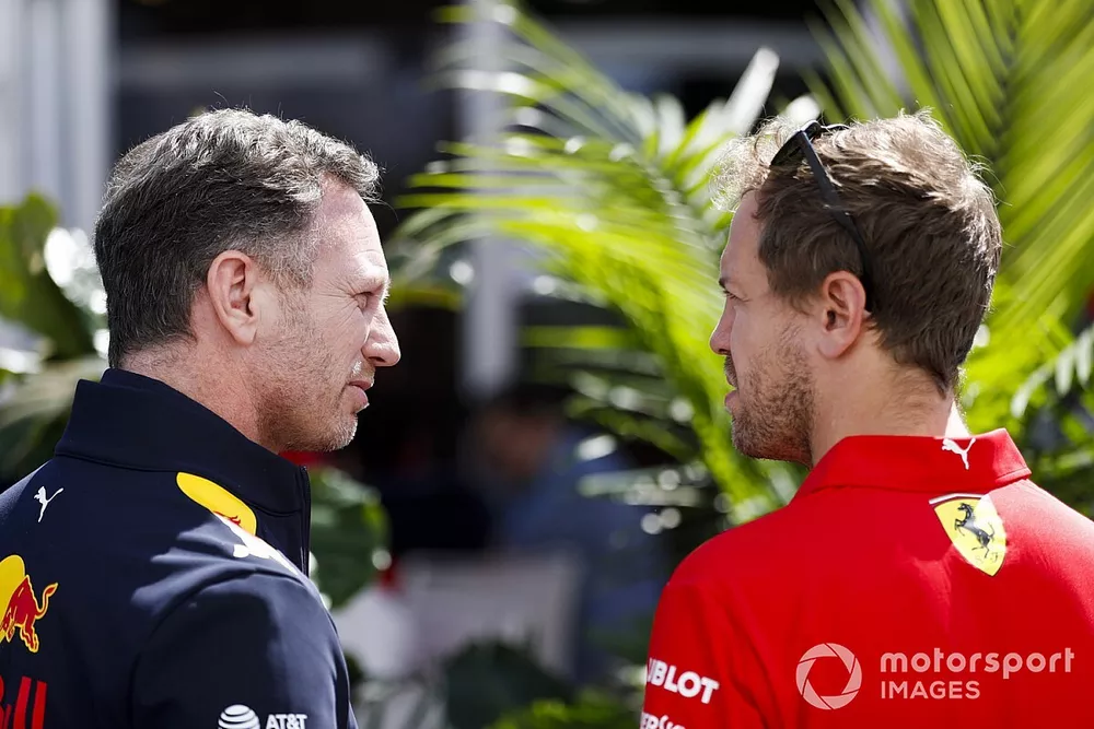 Christian Horner, Team Principal, Red Bull Racing and Sebastian Vettel, Ferrari 