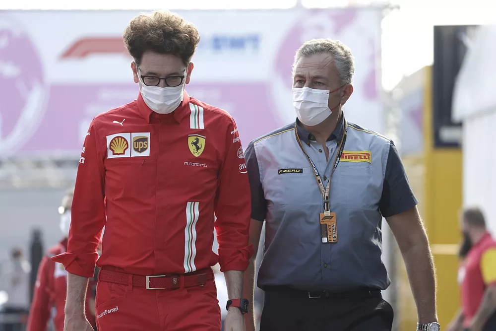Mattia Binotto, Team Principal, Ferrari Mario Isola, Racing Manager, Pirelli Motorsport