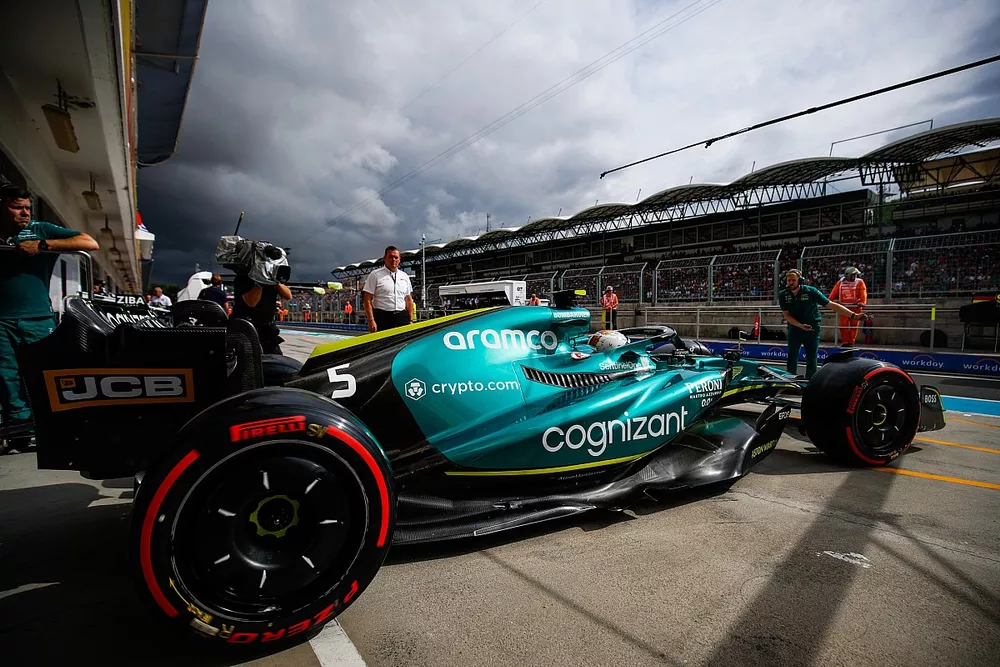 Sebastian Vettel, Aston Martin AMR22, leaves the garage