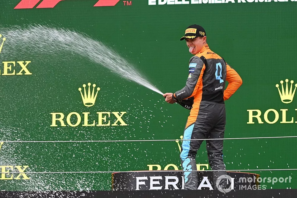 Lando Norris, McLaren, 3rd position, celebrates with Champagne on the podium