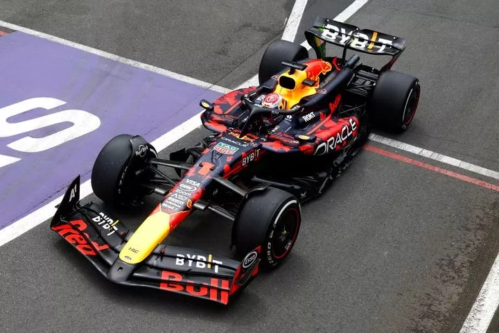 Max Verstappen, Red Bull Racing RB20, leaves the pit lane