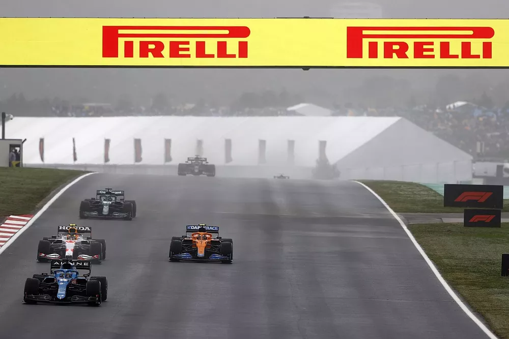 Fernando Alonso, Alpine A521, Sergio Perez, Red Bull Racing RB16B, Lando Norris, McLaren MCL35M, and Lance Stroll, Aston Martin AMR21