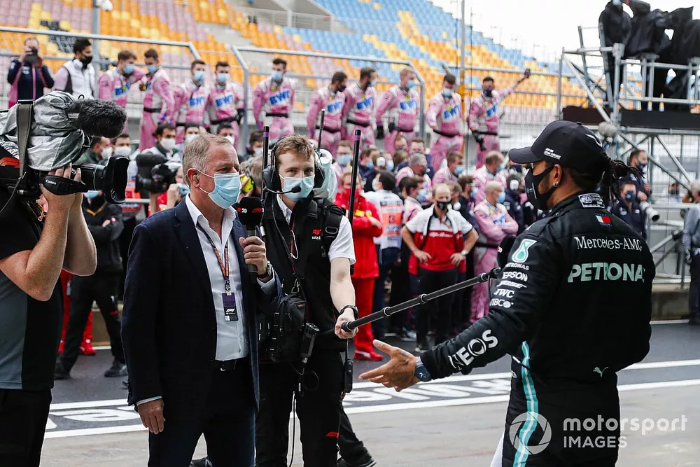 Lewis Hamilton, Mercedes-AMG F1, 1st position, is interviewed by Martin Brundle, Sky TV, after securing his seventh world drivers championship title