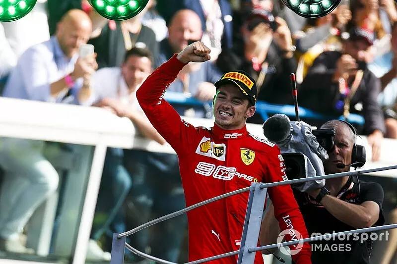 Charles Leclerc, Ferrari, 1st position, arrives on the podium