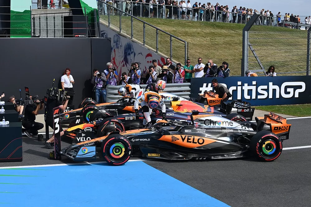Oscar Piastri, McLaren, Max Verstappen, Red Bull Racing, arrive in Parc Ferme at the end of Qualifying