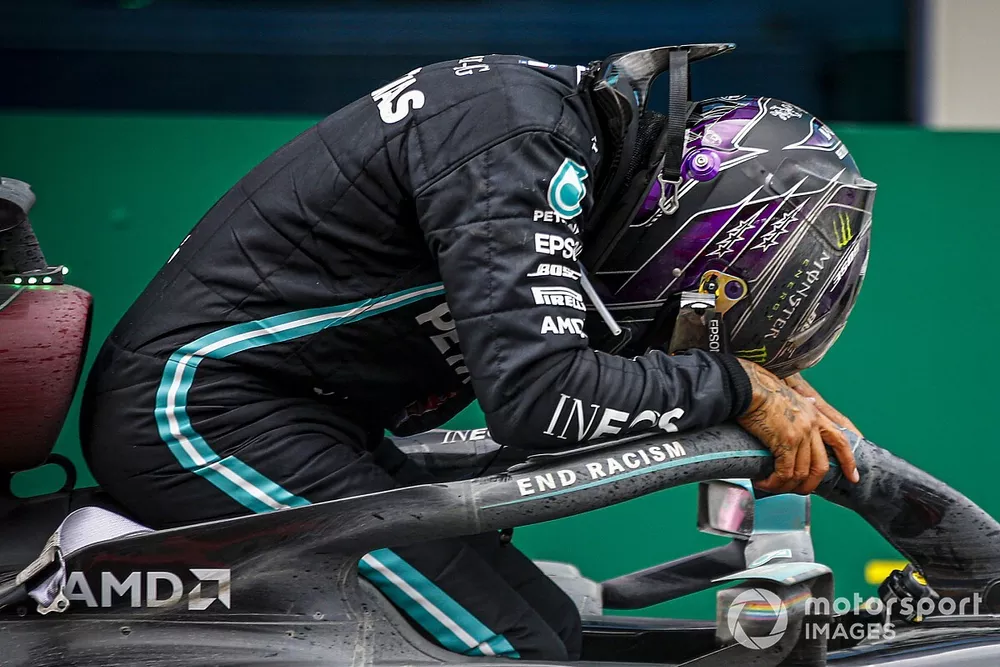 Lewis Hamilton, Mercedes-AMG F1, 1st position, arrives in Parc Ferme after securing his 7th world drivers championship title Lewis Hamilton, Mercedes-AMG F1, climbs out of his car after winning the race, to take his 7th World Championship title