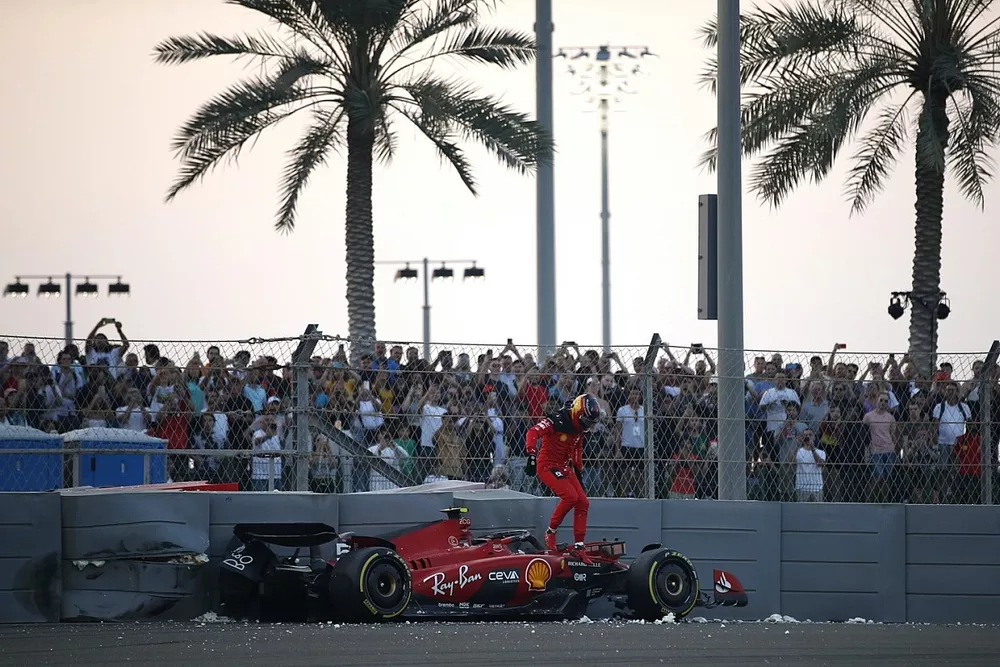Carlos Sainz, Ferrari SF-23, climbs out of his damaged car after crashing out in FP2
