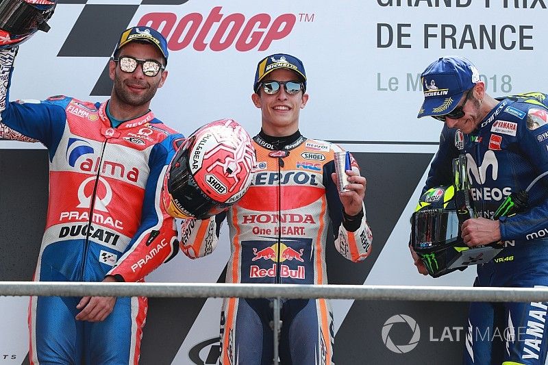 Race winner Marc Marquez, Repsol Honda Team, second place Danilo Petrucci, Pramac Racing, third place Valentino Rossi, Yamaha Factory Racing