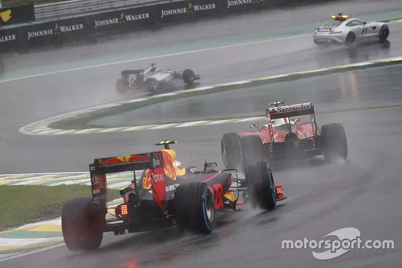 Kimi Raikkonen, Ferrari SF16-H, leads Max Verstappen, Red Bull Racing RB12