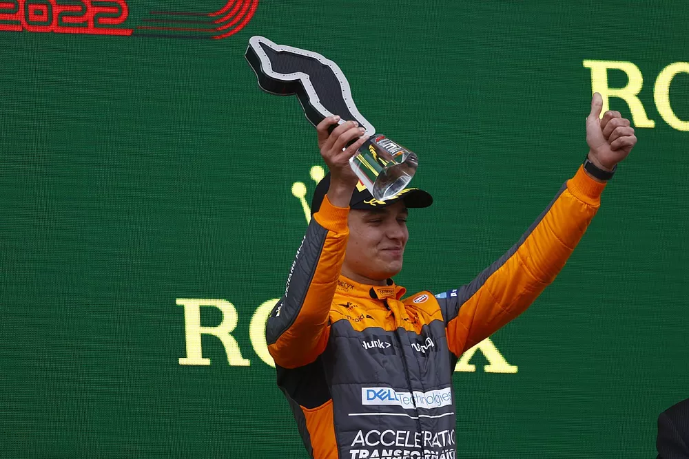 Lando Norris, McLaren, 3rd position, on the podium with his trophy