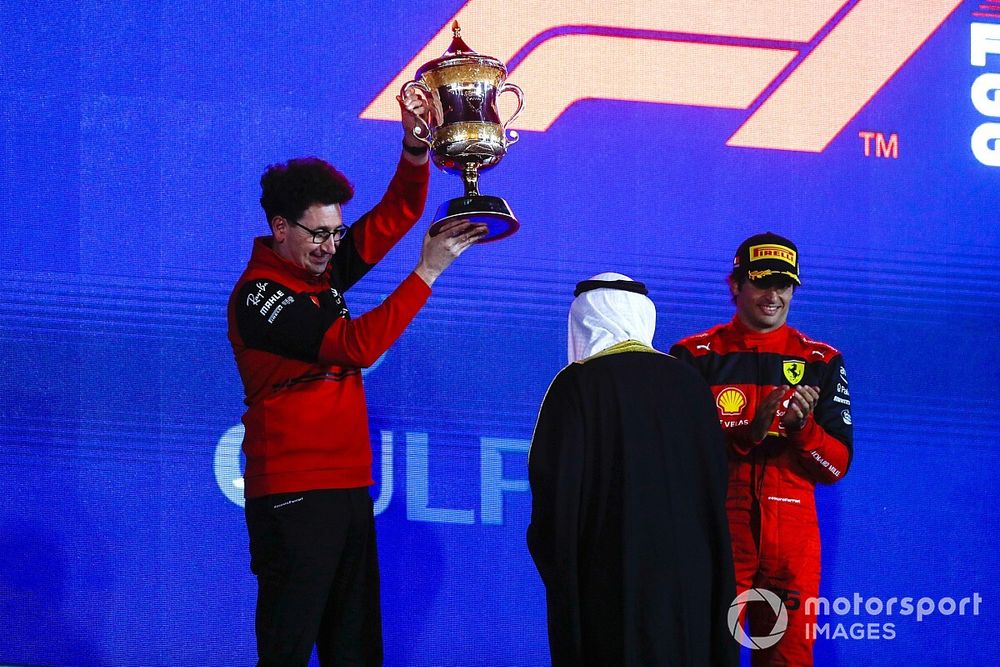 Mattia Binotto, Team Principal, Ferrari, lifts the Constructors trophy on the podium