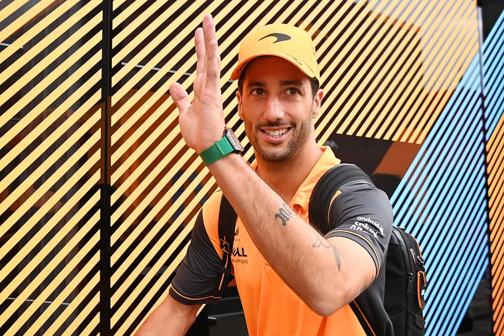 Daniel Ricciardo, McLaren, arrives into the paddock