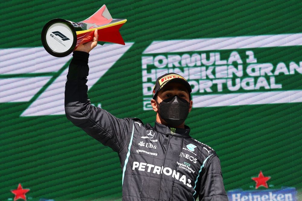 Lewis Hamilton, Mercedes, 1st position, lifts his trophy