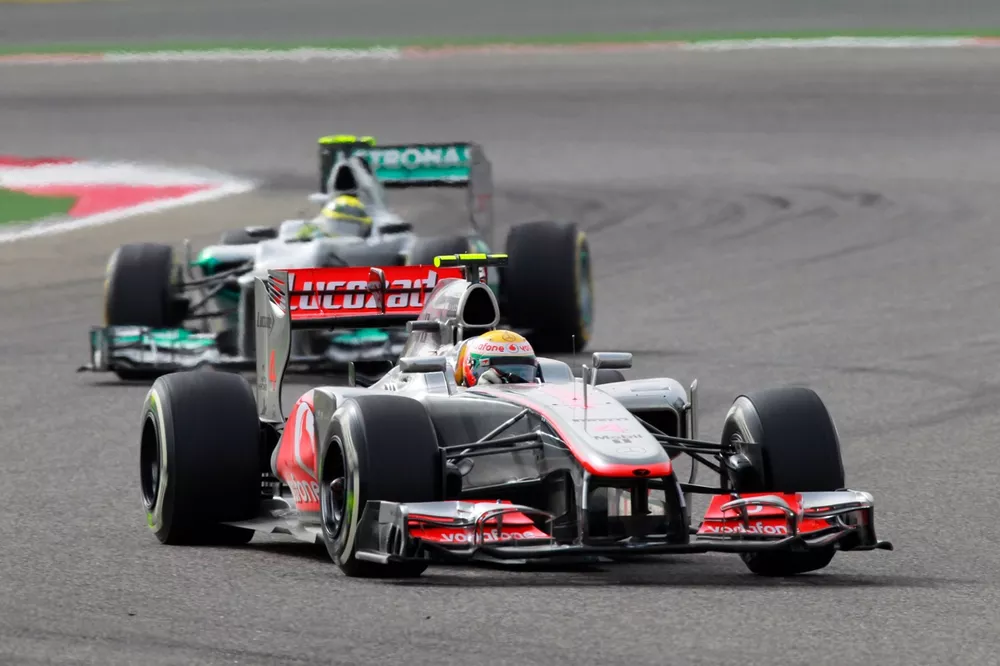 Lewis Hamilton, McLaren MP4-27 Mercedes, leads Nico Rosberg, Mercedes F1 W03