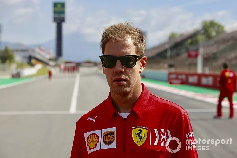 Sebastian Vettel, Ferrari, walks the track