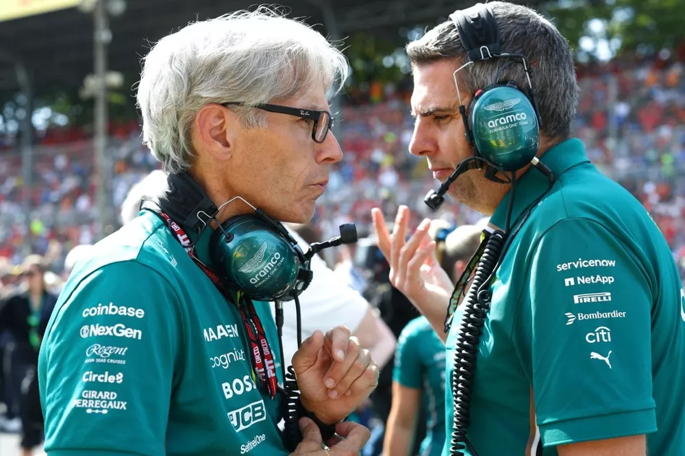 Mike Krack, Chief Trackside Officer of the Aston Martin F1 Team talks with Chris Cronin, Chief Engineer at Aston Martin F1 Team on the grid.