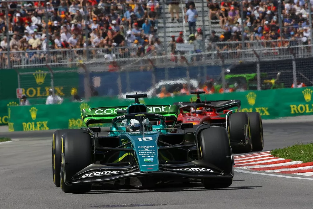 Lance Stroll, Aston Martin AMR22, Charles Leclerc, Ferrari F1-75
