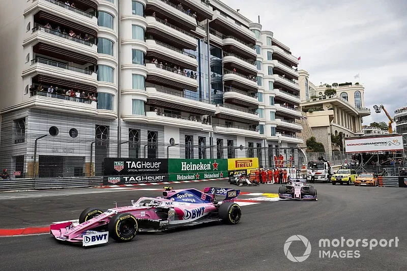 Lance Stroll, Racing Point RP19, leads Sergio Perez, Racing Point RP19, and Kimi Raikkonen, Alfa Romeo Racing C38