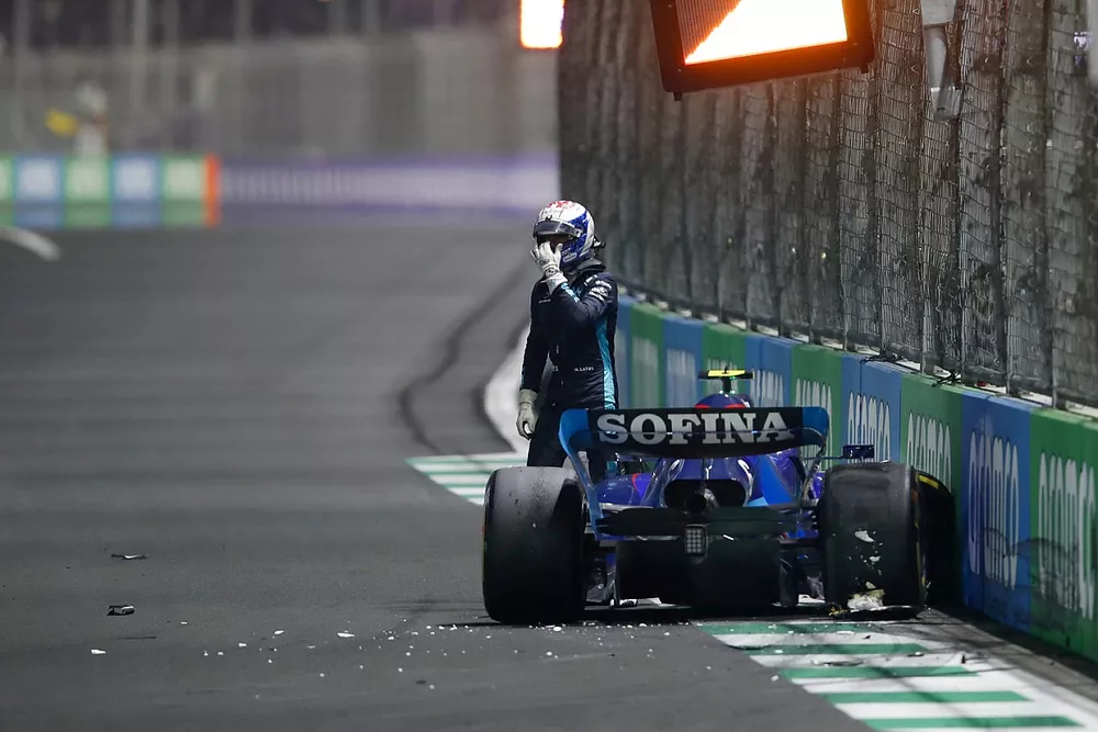 Nicholas Latifi, Williams FW44, climbs out of his car after crashing out of the race