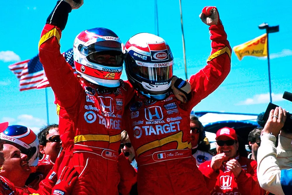 Alex Zanardi and teammate Jimmy Vasser celebrate a one-two finish for Target Chip Ganassi Racing