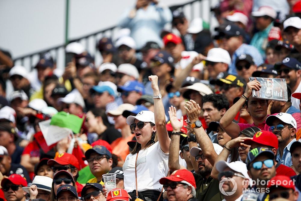 Fans cheer from the grandstands