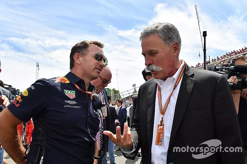 Christian Horner, Red Bull Racing Team Principal and Chase Carey, Chief Executive Officer and Executive Chairman of the Formula One Group on the grid on the grid
