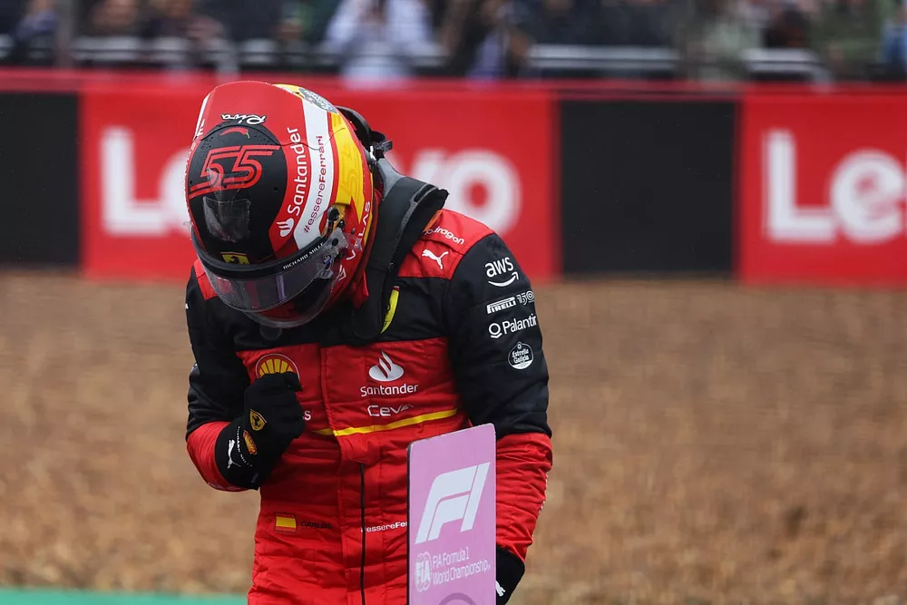 Pole position winner Carlos Sainz, Ferrari, celebrates in Parc Ferme