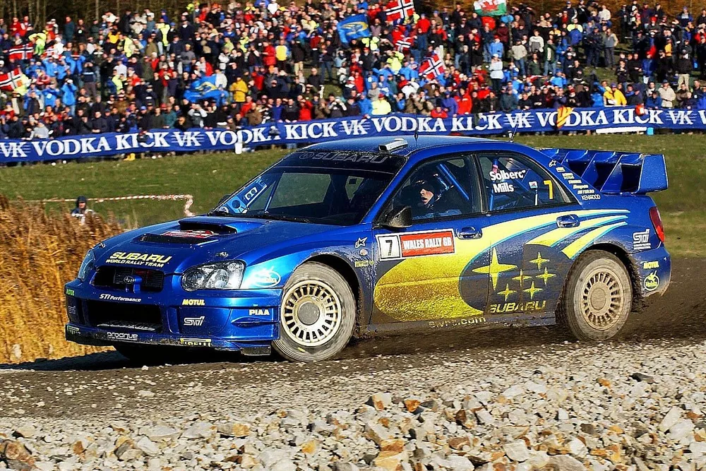 Petter Solberg (NOR) with co-driver Phil Mills (GBR) Subaru Impreza WRC in action on Stage 4, Rheola.