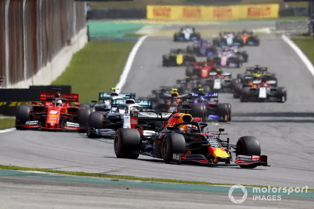 Max Verstappen, Red Bull Racing RB15 leads Lewis Hamilton, Mercedes AMG F1 W10 and Sebastian Vettel, Ferrari SF90 at the start of the race
