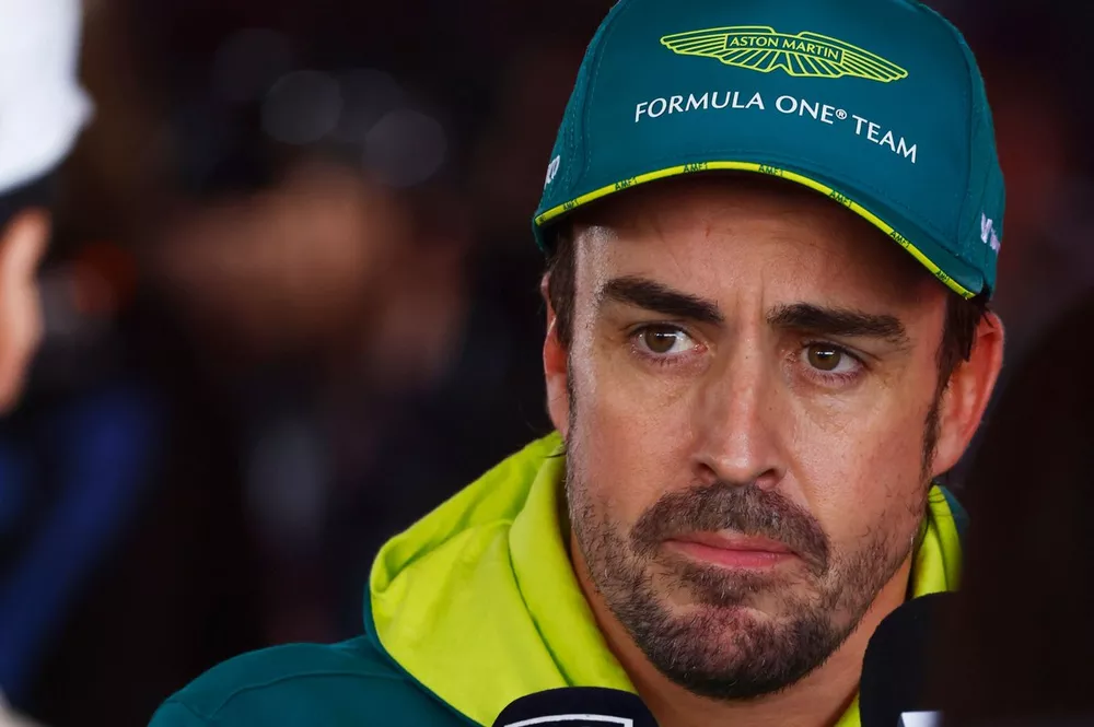 Fernando Alonso, Aston Martin F1 Team, talks to the media