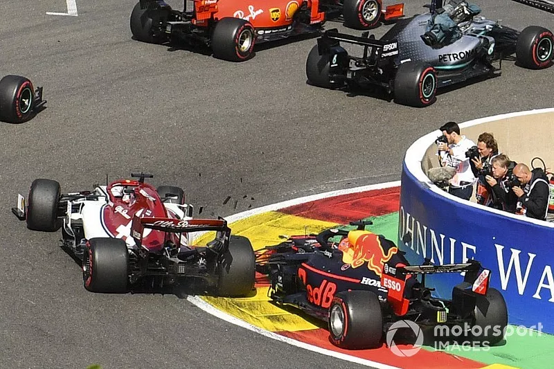 Charles Leclerc, Ferrari SF90, leads Sebastian Vettel, Ferrari SF90, Lewis Hamilton, Mercedes AMG F1 W10 and Valtteri Bottas, Mercedes AMG W10. Behind, Max Verstappen, Red Bull Racing RB15 makes contact with Kimi Raikkonen, Alfa Romeo Racing C38 