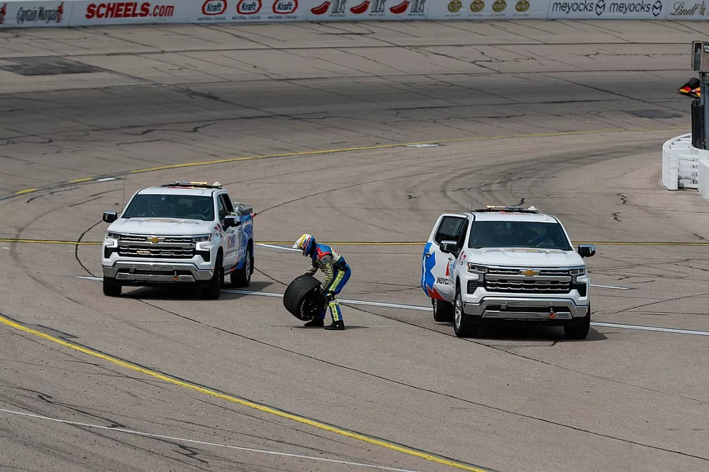 Stray tire being grabbed by AMR Safety team