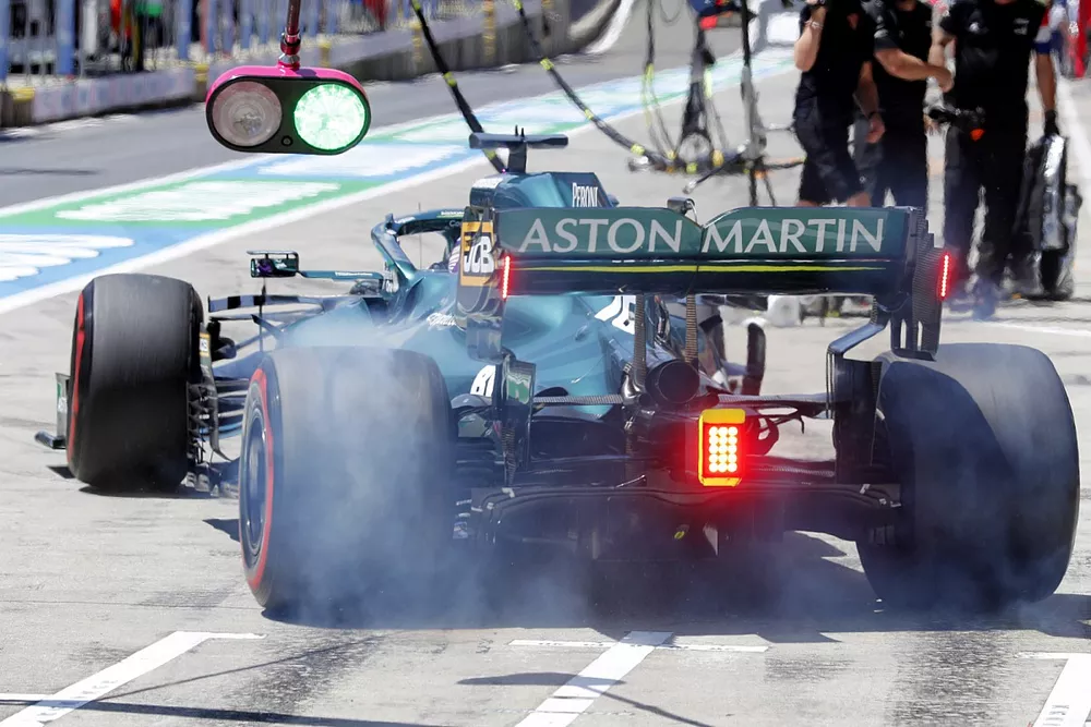 Lance Stroll, Aston Martin AMR21, in the pits