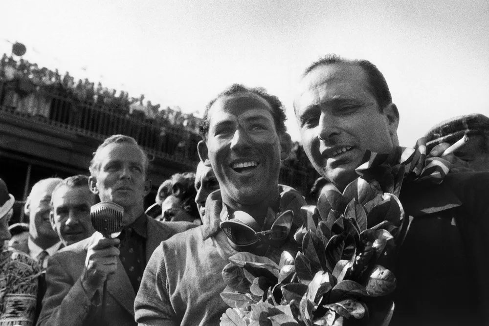 Race winner Stirling Moss, Mercedes-Benz W196; second place Juan Manuel Fangio, Mercedes-Benz W196