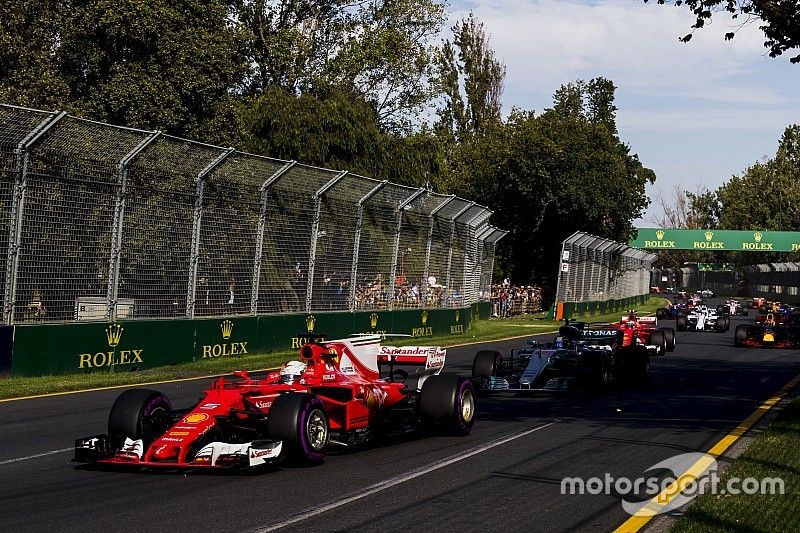 Sebastian Vettel, Ferrari SF70H, leads Valtteri Bottas, Mercedes AMG F1 W08
