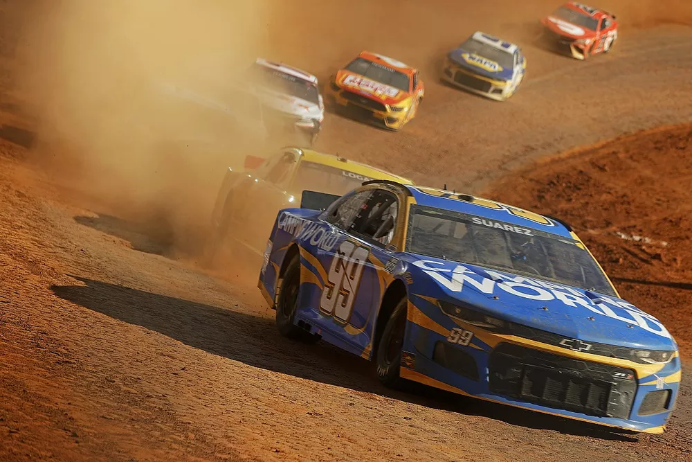 Daniel Suarez, TrackHouse Racing, Chevrolet Camaro Camping World leads the field
