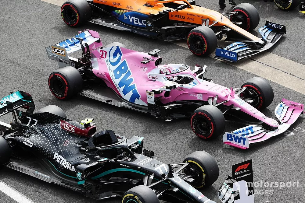 Los monoplazas del ganador de la pole Valtteri Bottas, Mercedes F1 W11, Nico Hulkenberg, Racing Point RP20, Lando Norris, McLaren MCL35, y Daniel Ricciardo, Renault F1 Team R.S.20, en Parc Ferme