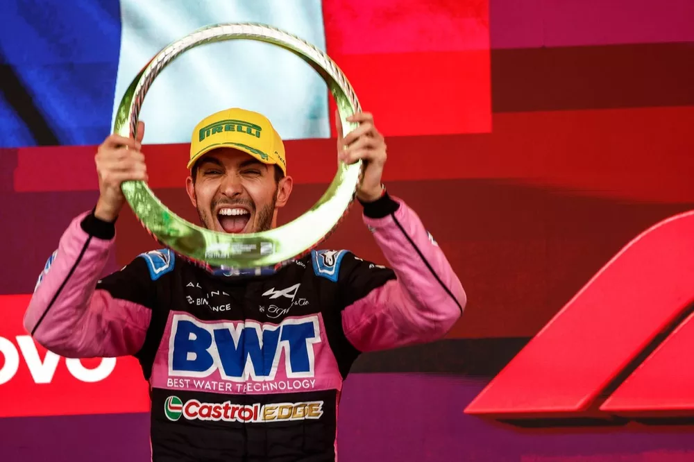 Esteban Ocon, Alpine F1 Team, 2nd position, celebrates with his trophy on the podium