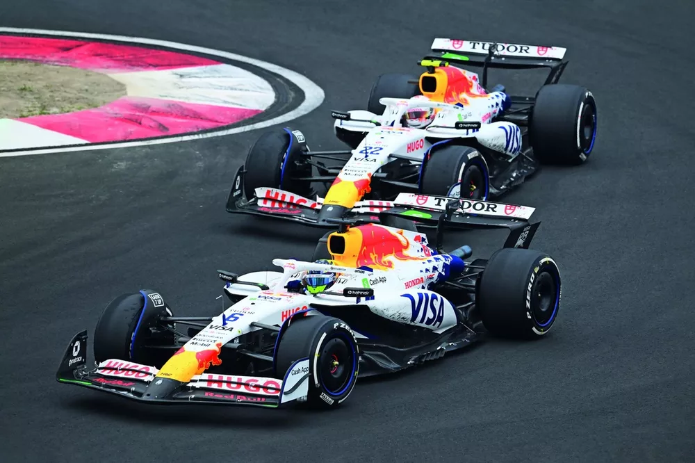 Isack Hadjar, Racing Bulls VCARB 02 leads Yuki Tsunoda, Racing Bulls VCARB 02