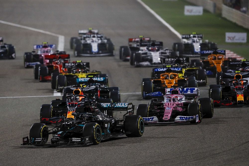 Lewis Hamilton, Mercedes F1 W11, Sergio Perez, Racing Point RP20 and Max Verstappen, Red Bull Racing RB16 at the start of the race