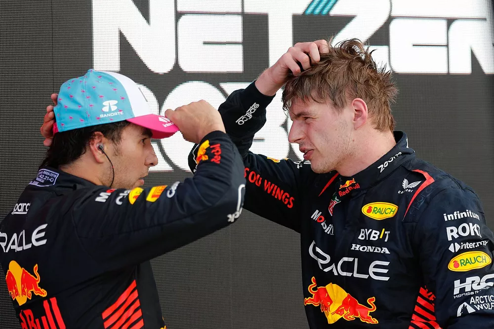 Sergio Perez, Red Bull Racing, 2nd position, Max Verstappen, Red Bull Racing, 1st position, talk in Parc Ferme