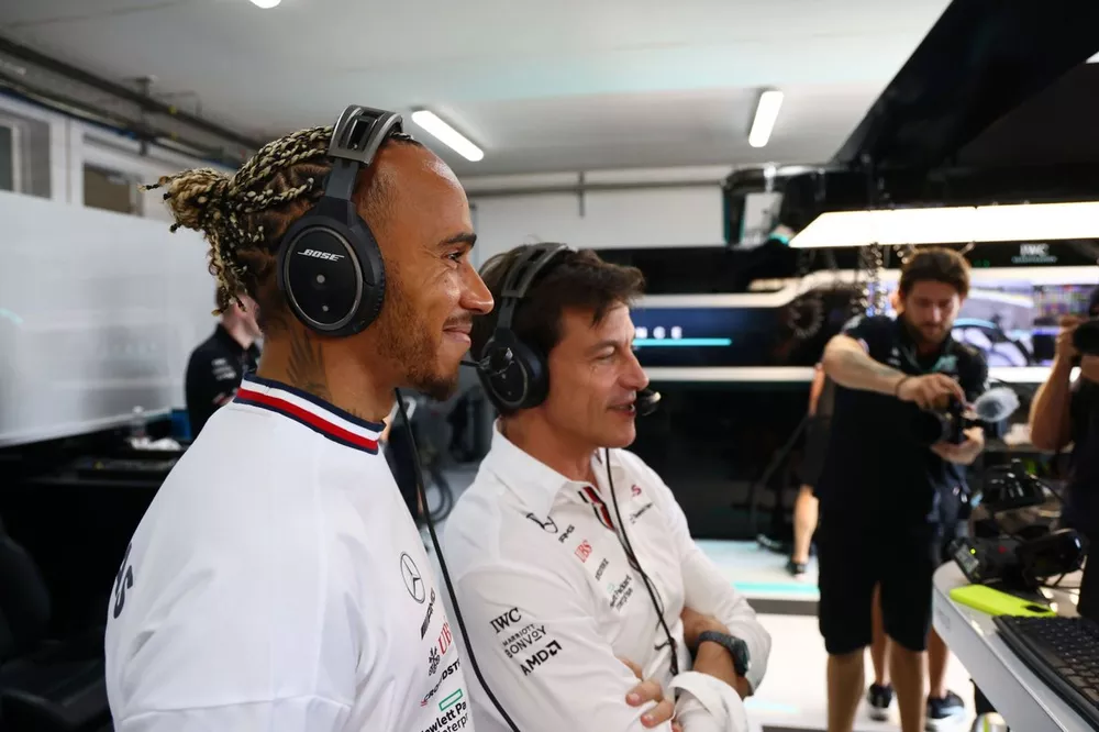Lewis Hamilton, Mercedes-AMG, watches on with Toto Wolff, Team Principal and CEO, Mercedes AMG 