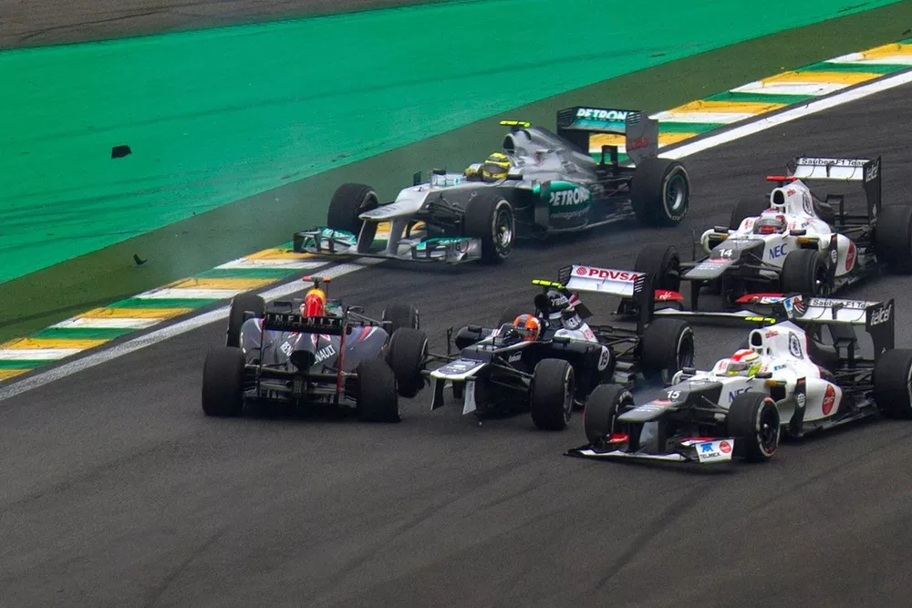 Bruno Senna, Williams FW34 Renault colides with Sebastian Vettel, Red Bull RB8 Renault