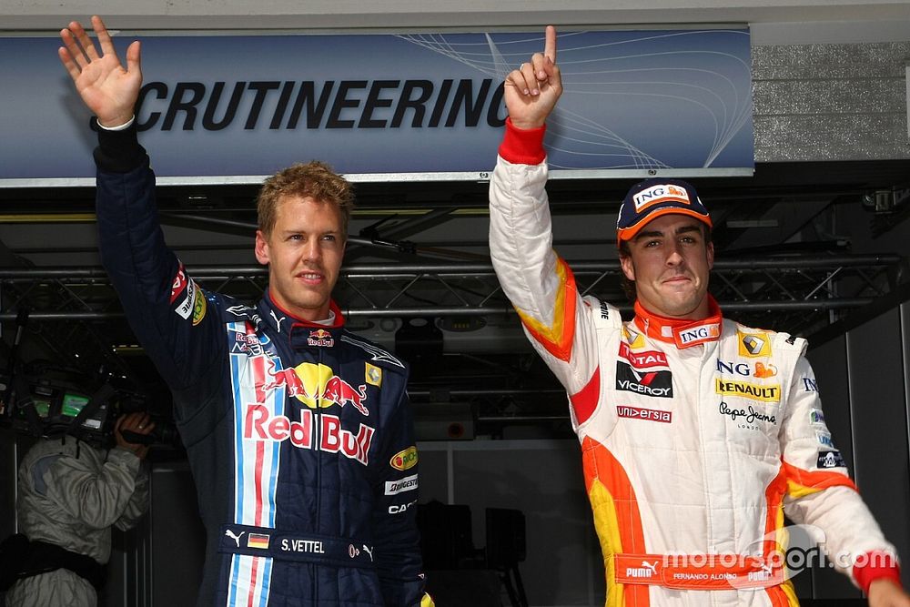 Pole winner Fernando Alonso, Renault F1 Team, with second place Sebastian Vettel, Red Bull Racing