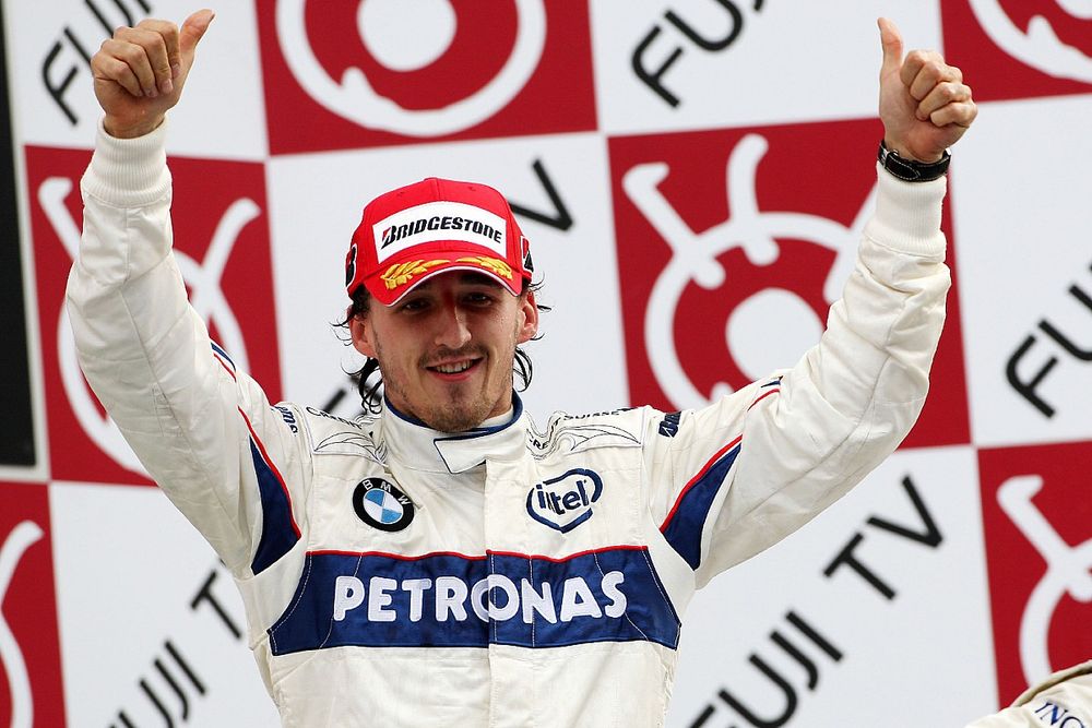 Podium: second place Robert Kubica