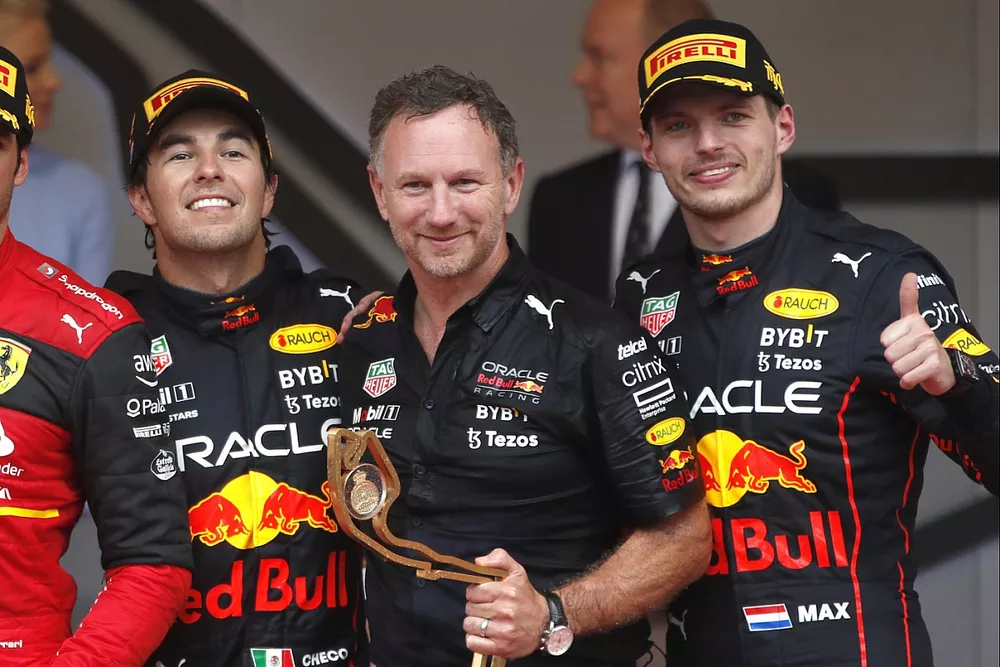 Carlos Sainz, Ferrari, 2nd position, Sergio Perez, Red Bull Racing, 1st position, Christian Horner, Team Principal, Red Bull Racing, Max Verstappen, Red Bull Racing, 3rd position, on the podium