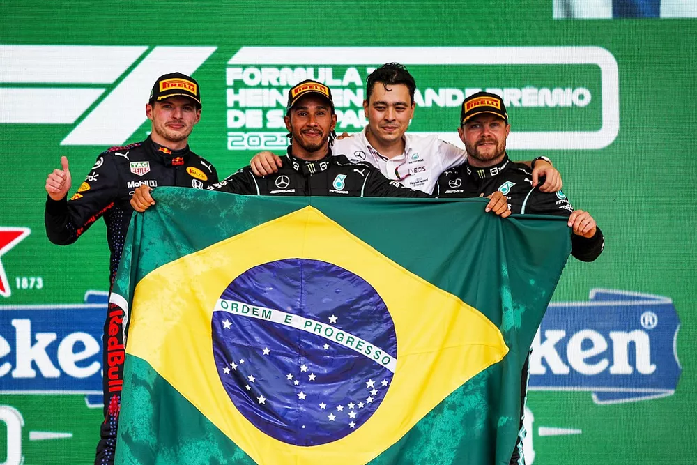 Max Verstappen, Red Bull Racing, 2nd position, Lewis Hamilton, Mercedes, 1st position, the Mercedes trophy delegate and Valtteri Bottas, Mercedes, 3rd position, on the podium