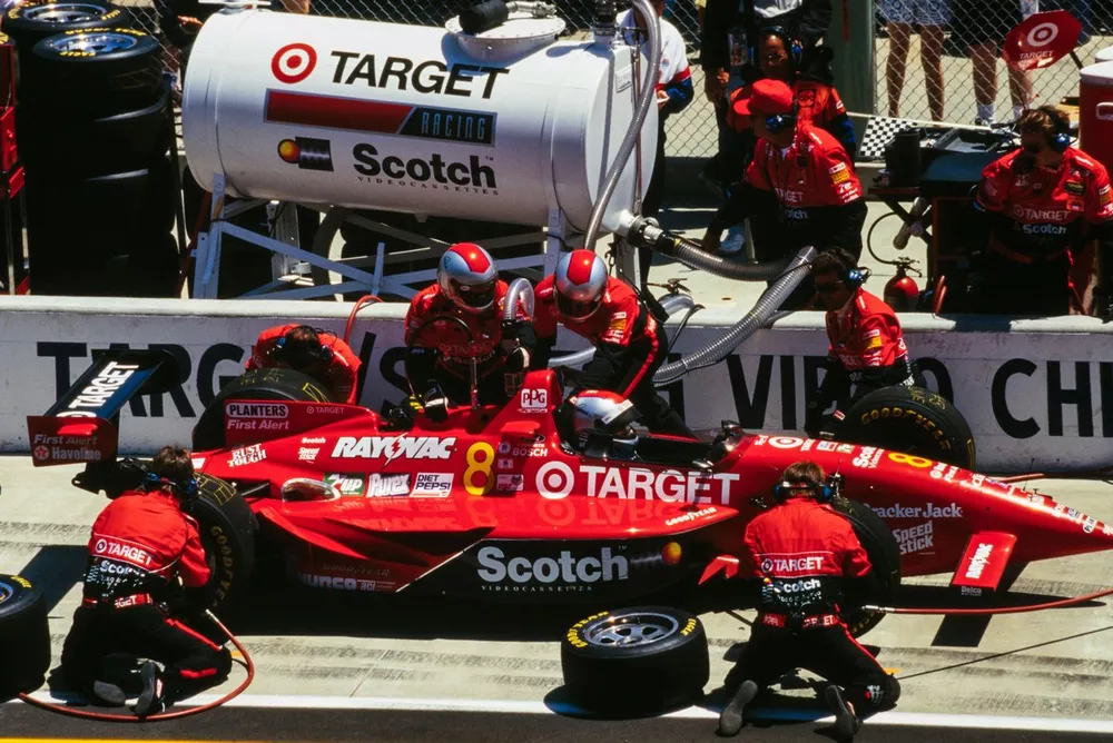 Michael Andretti, Chip Ganassi Racing, Reynard 94i Ford, makes a pitstop.