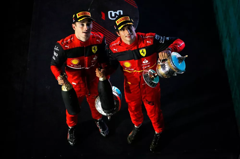 Charles Leclerc, Ferrari, 1st position, Carlos Sainz Jr., Ferrari, 2nd position, with their trophies