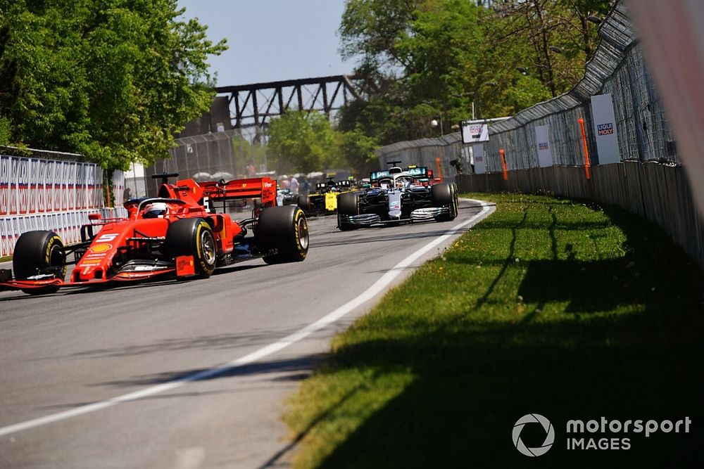 Sebastian Vettel, Ferrari SF90, leads Lewis Hamilton, Mercedes AMG F1 W10, Charles Leclerc, Ferrari SF90, Daniel Ricciardo, Renault R.S.19, Pierre Gasly, Red Bull Racing RB15, and Nico Hulkenberg, Renault R.S. 19, at the start